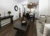 Thumbnail 8 of 28 - Living Room with Kitchen View at Eucalyptus Grove Apartments, California